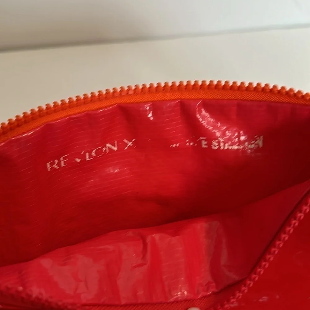 The Revlon x Megan Thee Stallion makeup bag with oversized zipper